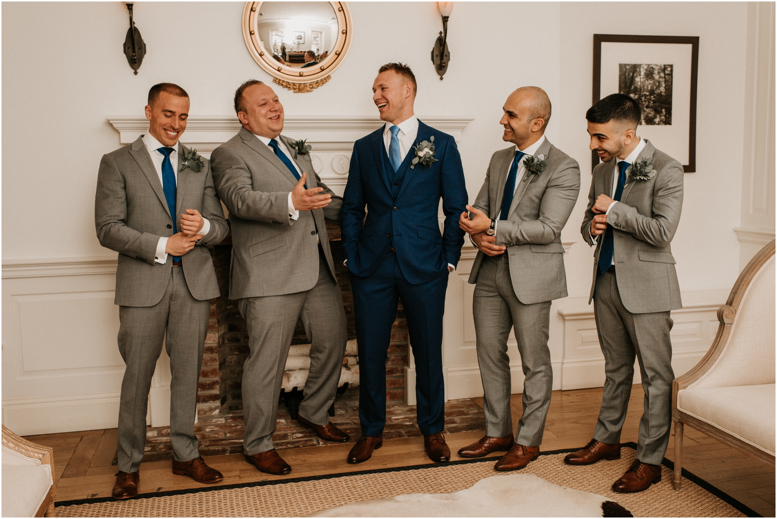 groom and groomsmen laughing