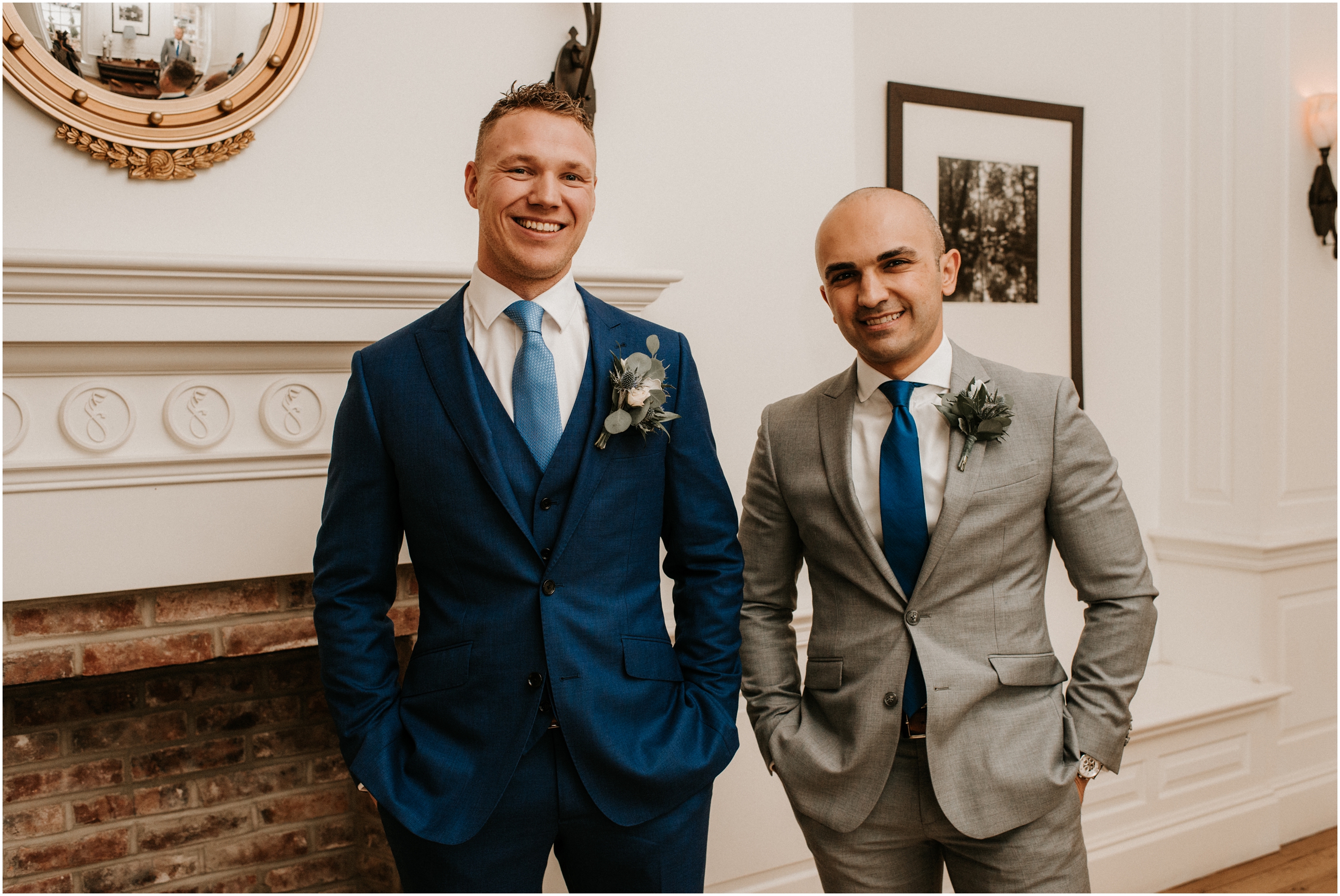 groom and best man smiling at camera