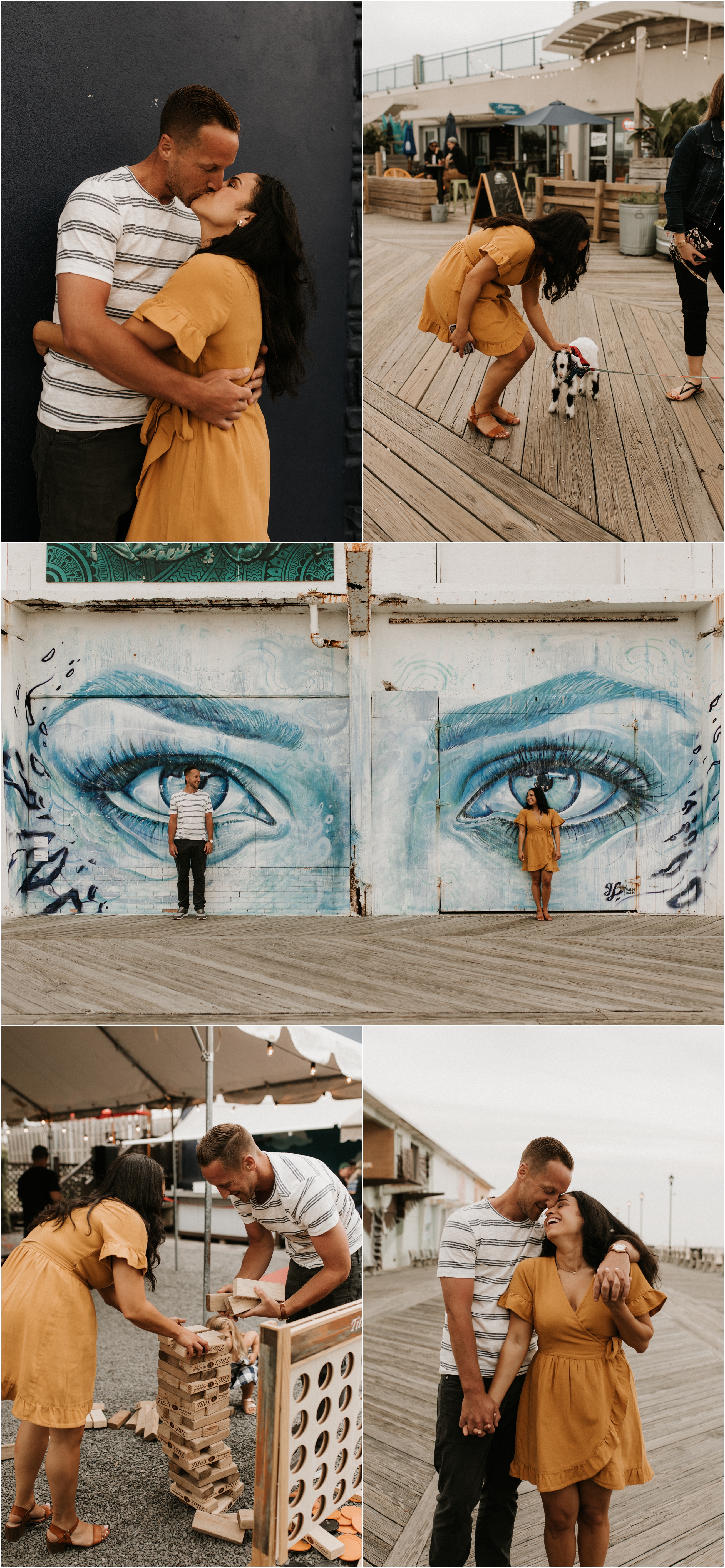 couple in front of mural of two eyes on boardwalk