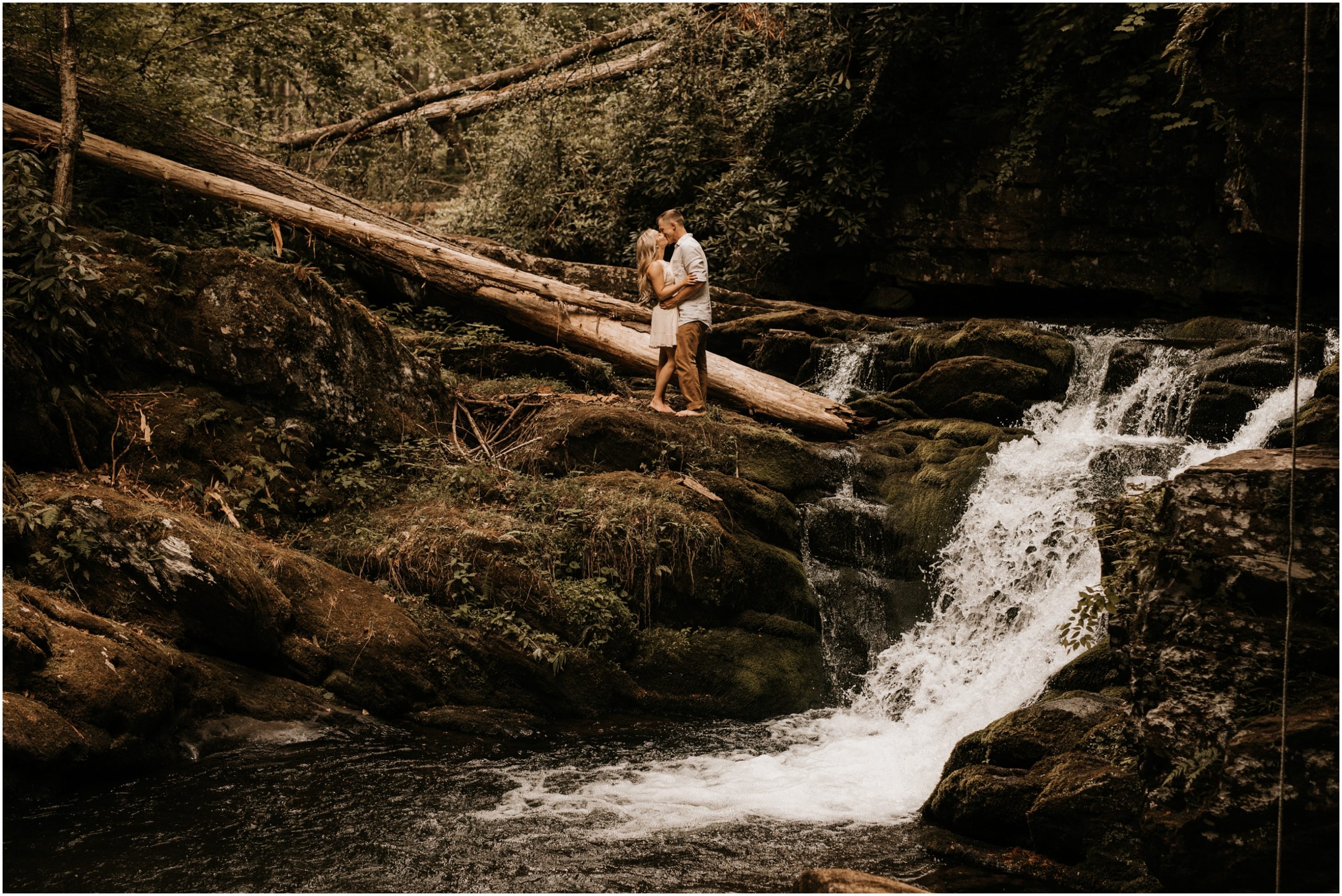 couple kissing in new jersey waterfall