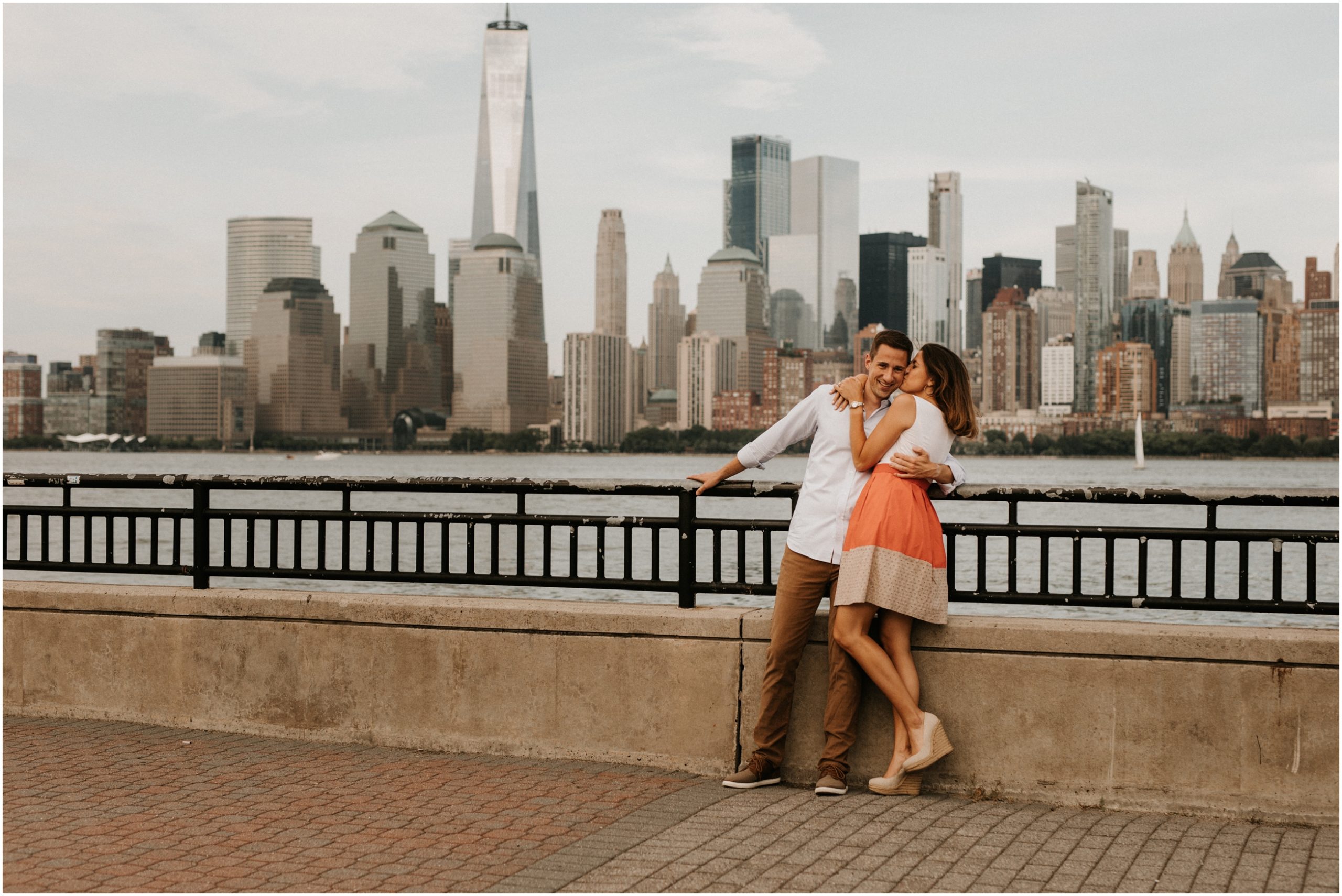 couple in front of nyc skyline
