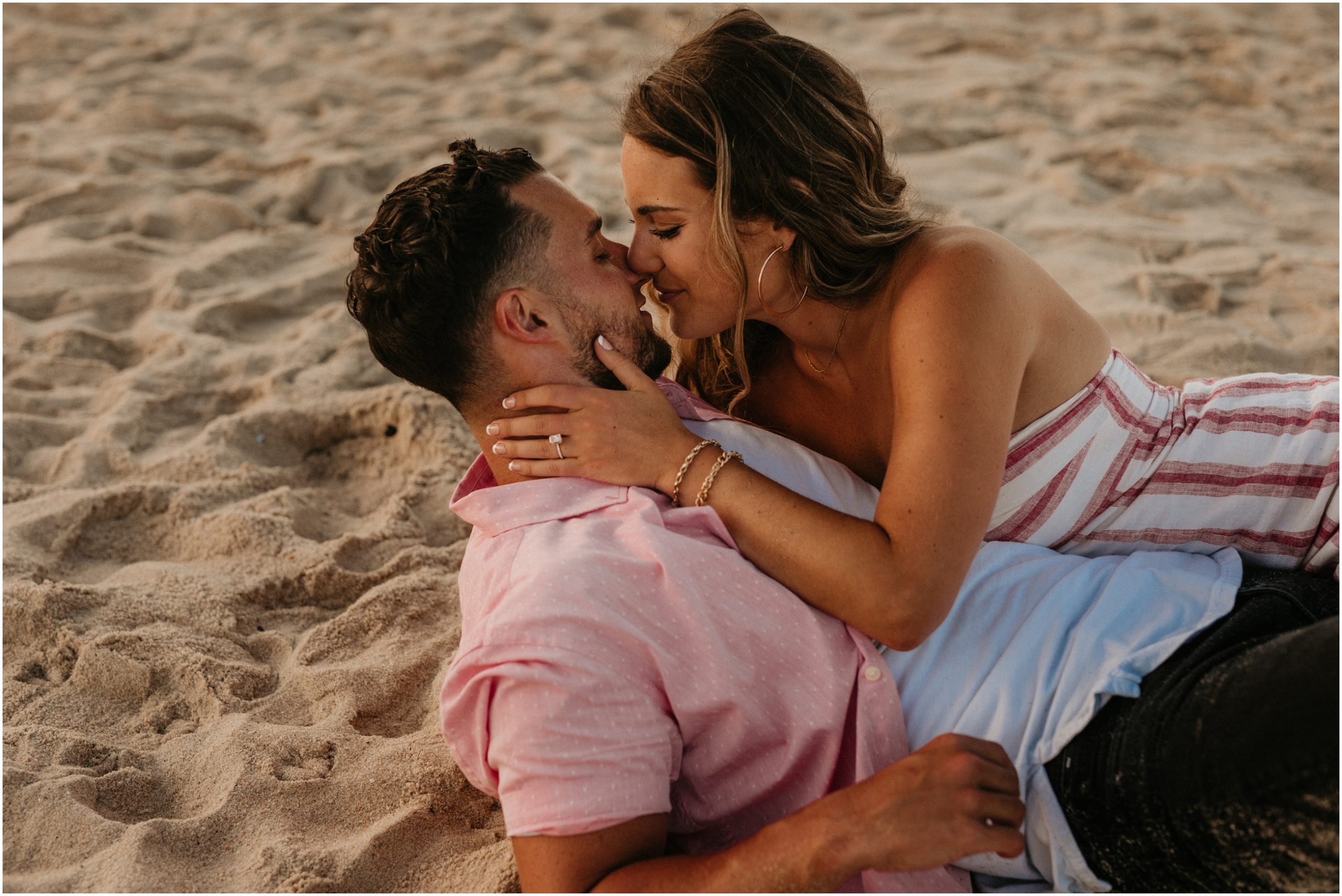 couple kissing on beach in long branch new jersey