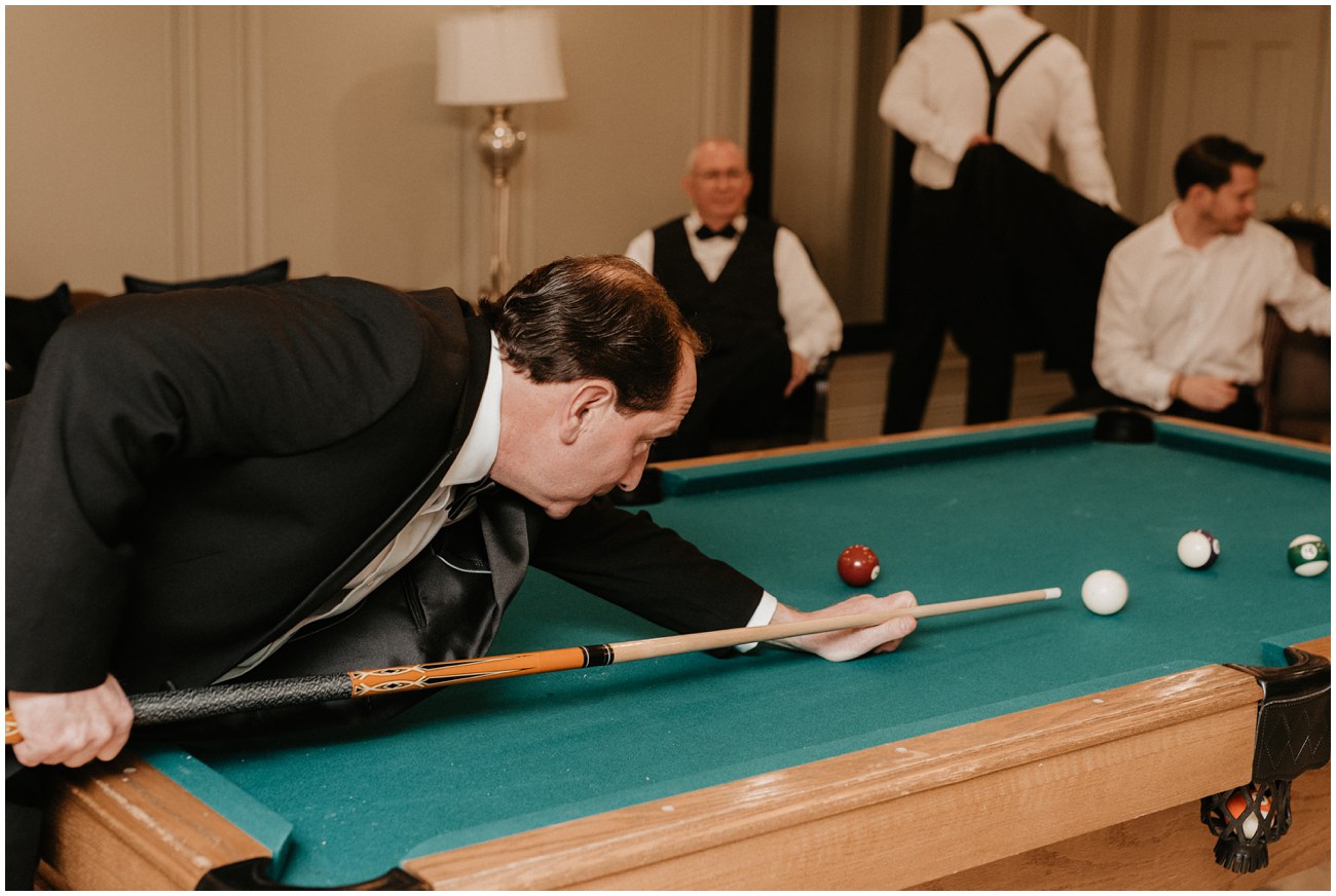 bride's father playing pool