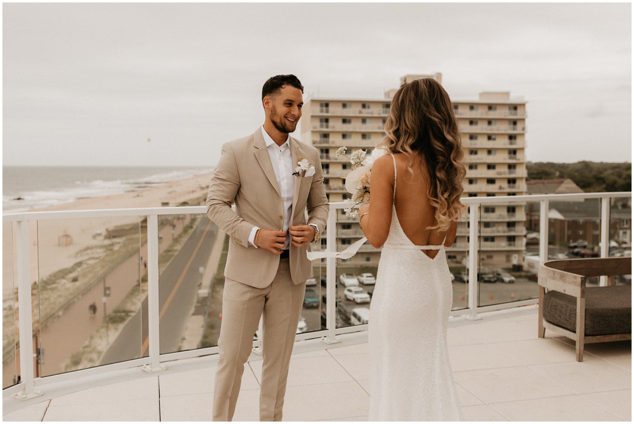 bride and groom first look on balcony of Wave Resort in Long Branch, NJ