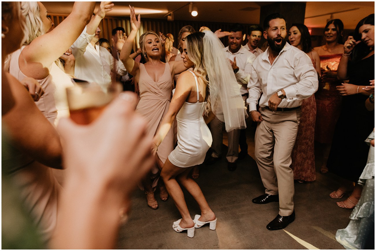 bride and guests dancing at wedding reception at wave resort in long branch new jersey