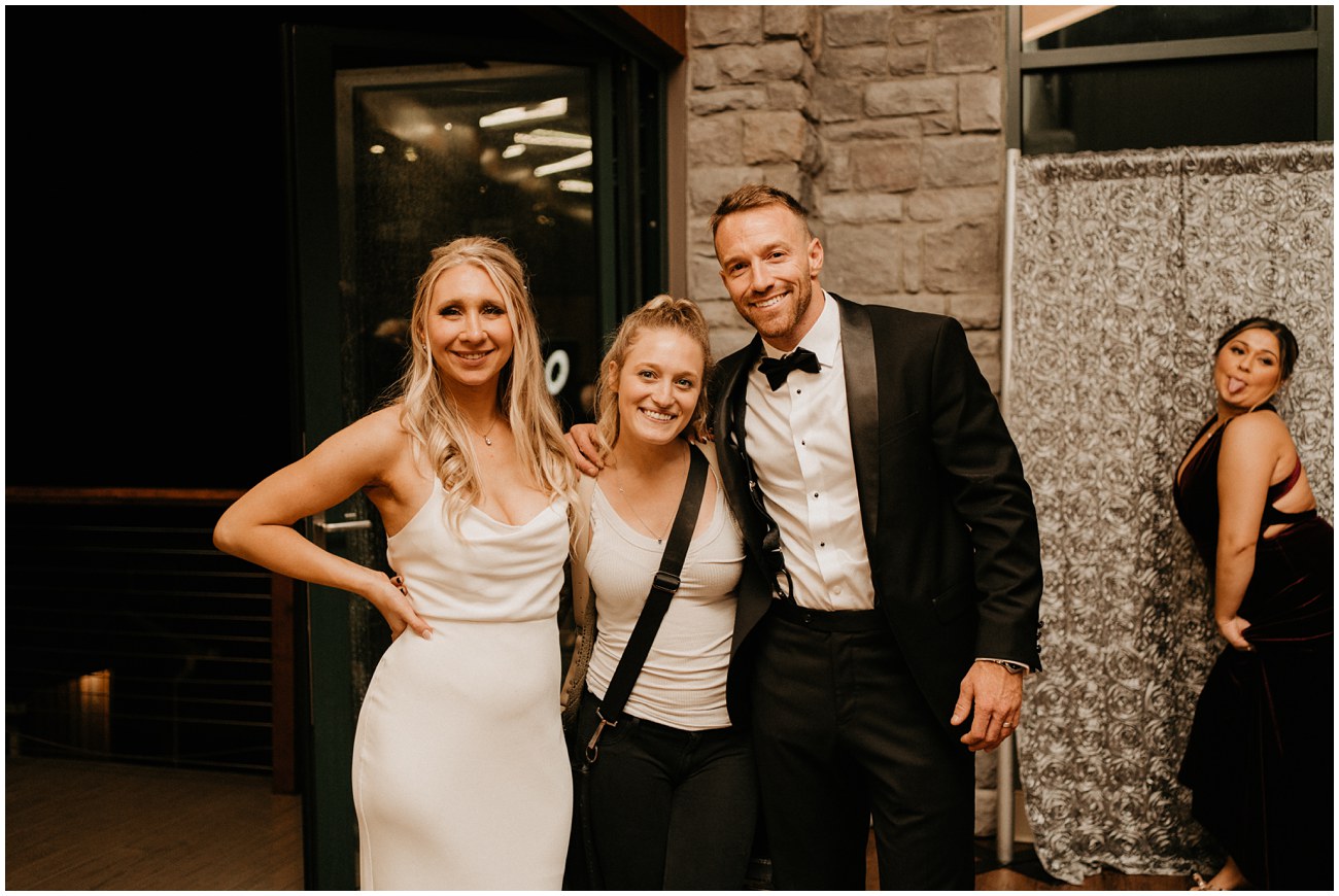 Bride and Groom with photographer, Tori Kelner, at Trout Lake wedding