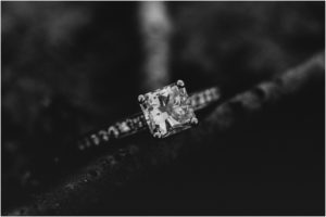 black and white image of engagement ring