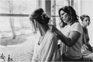 black and white bride getting hair done