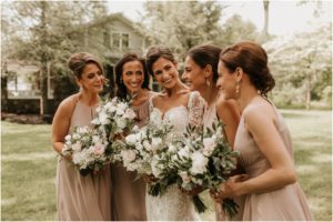 bridesmaids laughing at each other