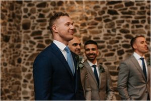groom seeing bride for first time at ceremony