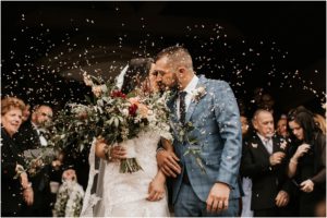 bride and groom wedding ceremony confetti exit