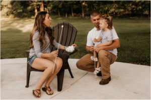 family bonfire making smores