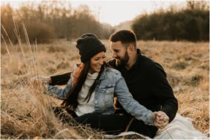 couple laughing during sunset in new jersey