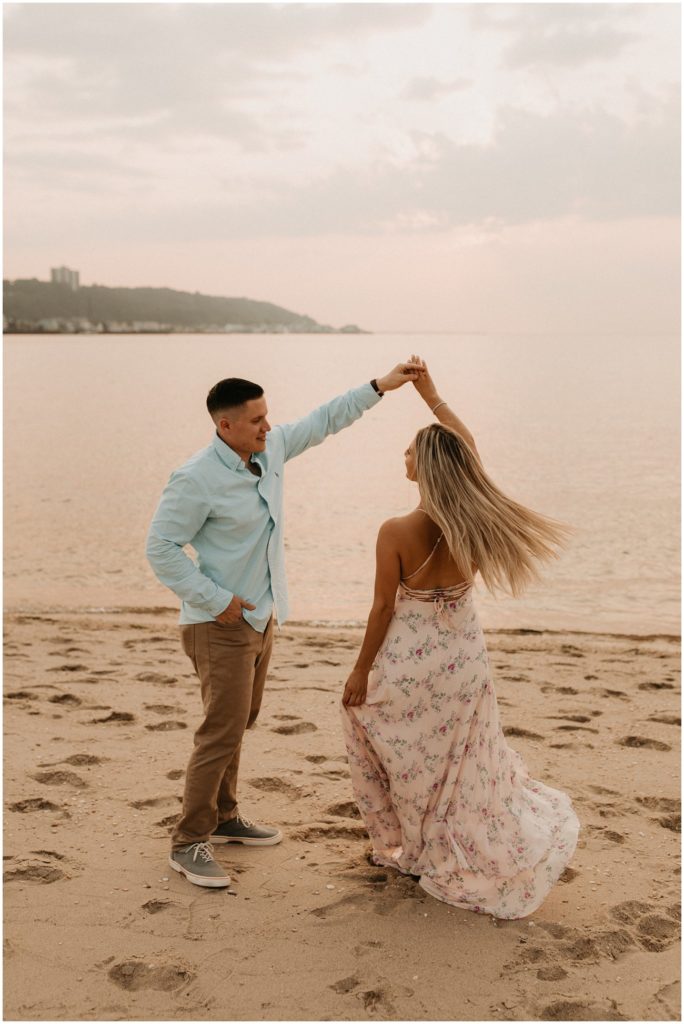 Couple shares a dance on the beach